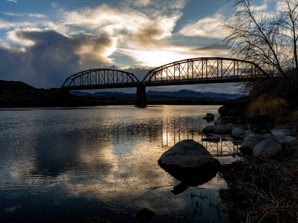 Bridge crosses the Snake River in Idaho at sunset