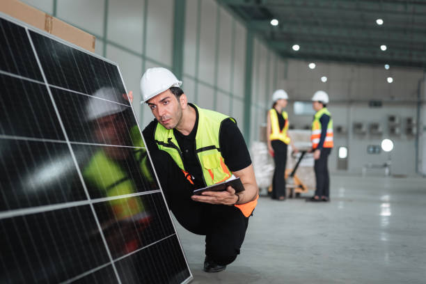 istock Team engineers workers and check up solar cell panel if there is a damaged part in factory. Concept industrial and commercial. 1482629869