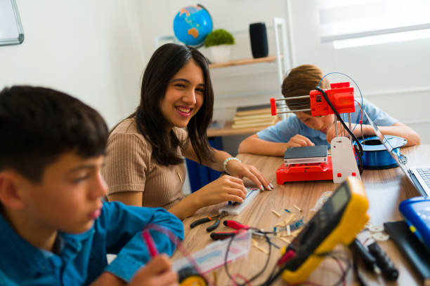 istock Excited smart girl having fun in a robotics course at school 1482633566