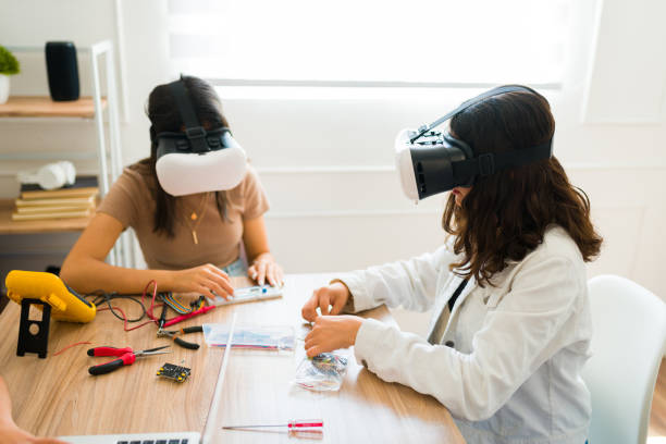 istock Teen students having fun with virtual reality and learning in school 1482634579