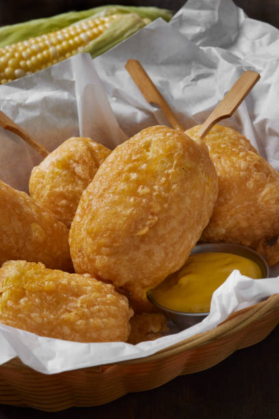 Beer Battered Corn on the Corn Beer Battered Corn on the Corn with Spicy Mustard Dip corn cob eaten stock pictures, royalty-free photos & images