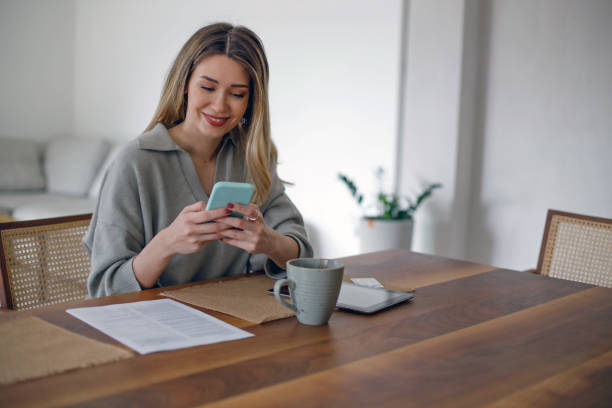 istock Happy young woman shopping online 1482650247