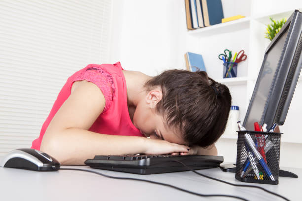 Young business girl in office stock photo