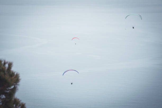 Paraplanners with beautiful blue sky and clouds in the background