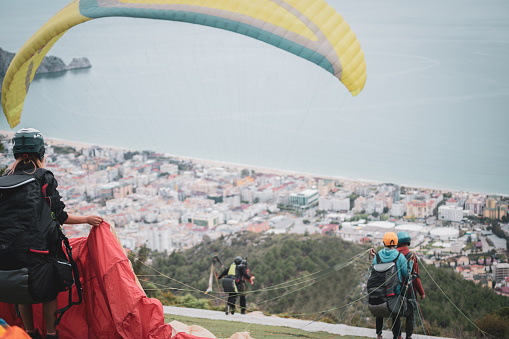 People are preparing to fly with paragliding on Alanya hill