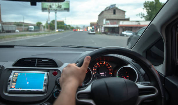 istock A man drives a car through gps 1482667943