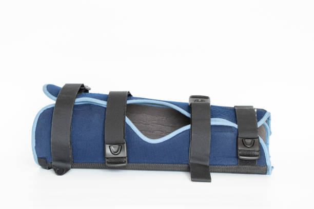 istock Knee brace blue post-operative on a white background close-up 1482667962