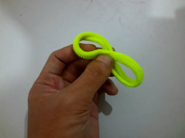 istock green hair tie 1482672745