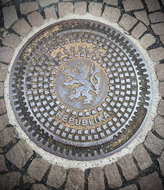 Berlin, Germany - June 17, 2024: A manhole cover on a cobblestone street in Berlin