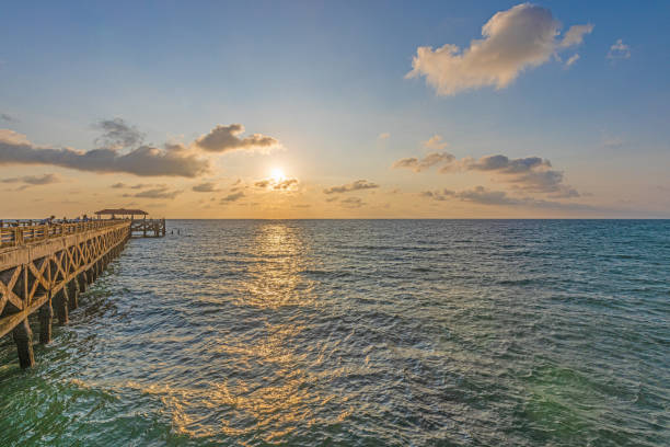 istock Sunset at Natai Beach pier in Thailand 1482680299