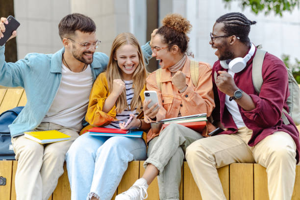 istock Cheerful students received a good news 1482680454