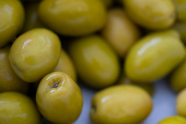 background, branch, closeup, diet, food, fresh, greece, greek, green, healthy, ingredient, isolated, italy, large, macro, mediterranean, natural, oil, olive, olives, organic, raw, ripe, spain, tasty, twig, vegetable, vegetarian, white, yellow