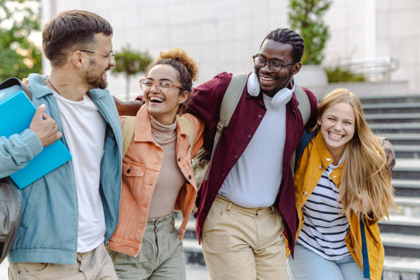 istock Happy group of students on the street 1482681467