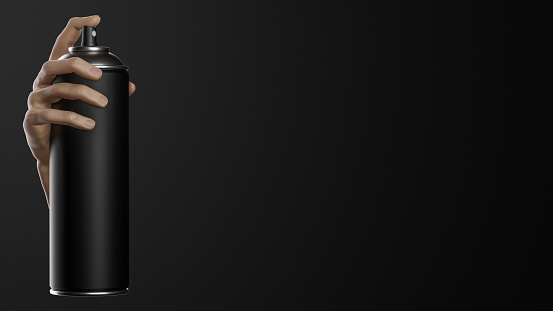 3d rendering of hand holding black spray can on black background, with copy space.