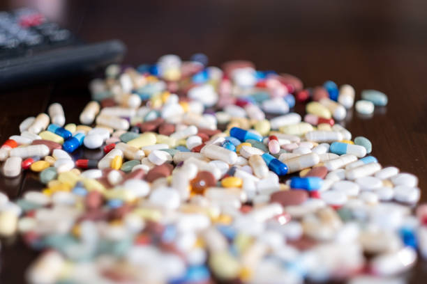 Colorful drugs are scattered on the table