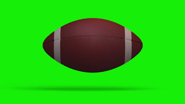 American football  sport ball rotating on green chroma key background (Loop 4k + alpha channel)
