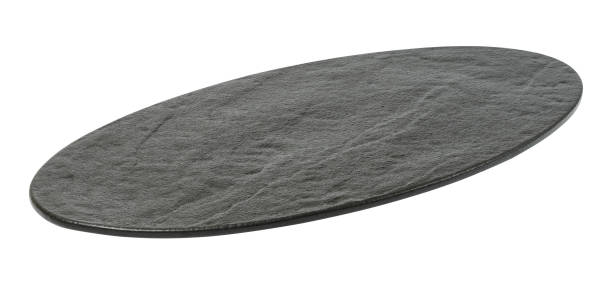 istock Empty black oval board for serving food on a white isolated background 1482685958