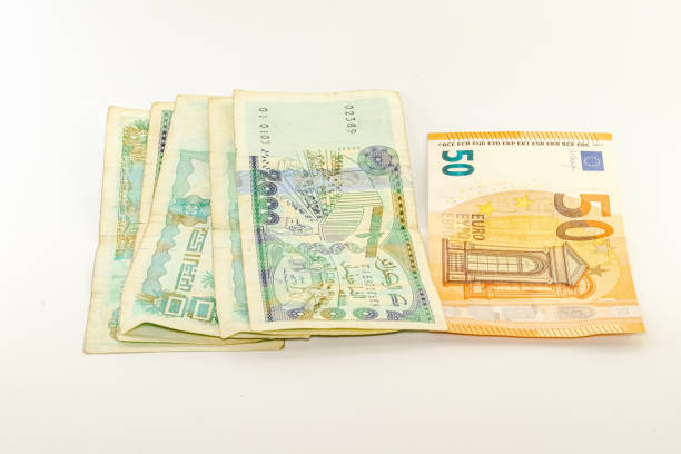 istock Euros and Algerian dinars. 1482687899