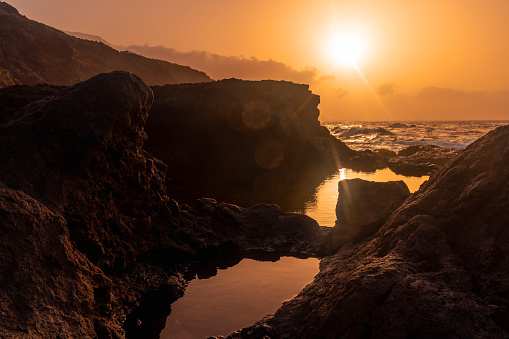 El Hierro Island. Canary Islands, beautiful landscape in the natural pool of Charco Azul in the spring sunset