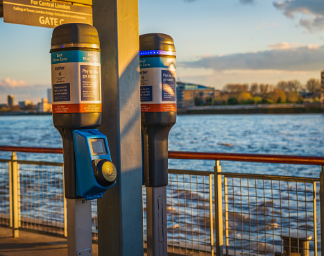 London, England - April 07 2023 : Oyster card reader for Uber Boat users in canary wharf,London