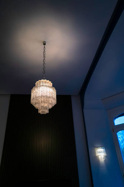 istock Chandelier hanging from the high ceiling in Italian interior setting 1482700007