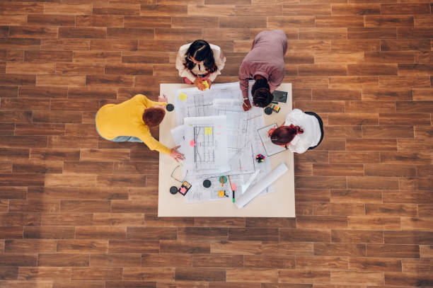istock Multiracial team of engineers or architects having a meeting in an office 1482704381