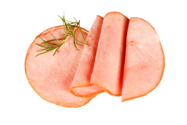 istock Pork ham slices isolated on white background 1482707776