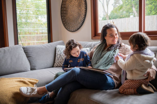 istock A mother reading with her two children 1482708458