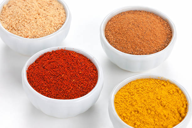 istock Different spices in bowls isolated on white background. 148270899