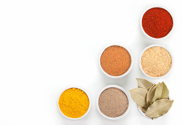 istock Different spices in bowls isolated on white background. 148271008