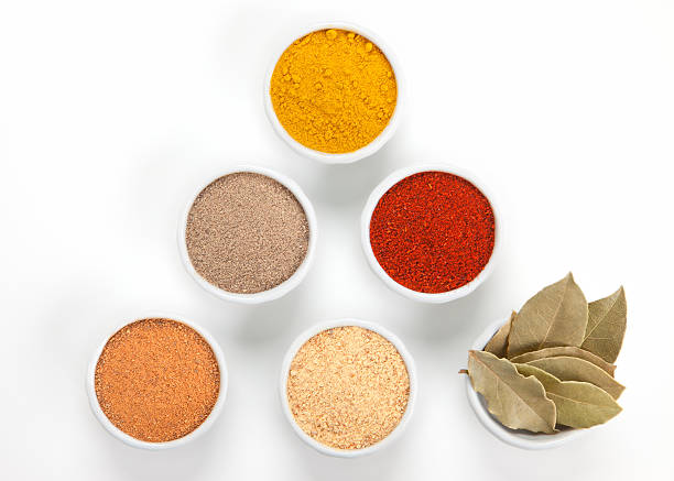 istock Different spices in bowls isolated on white background. 148271025