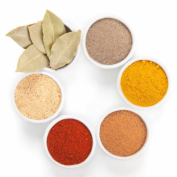 istock Different spices in bowls isolated on white background. 148271075
