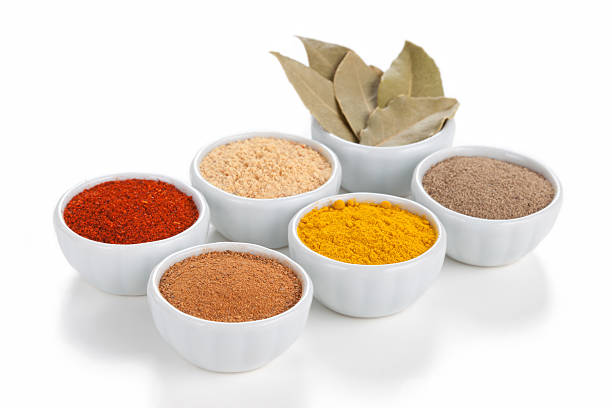 istock Different spices in bowls isolated on white background. 148271080