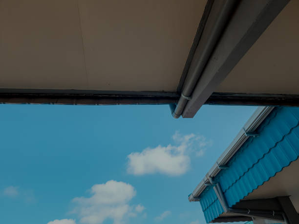 istock roof gutters and sky 1482713656