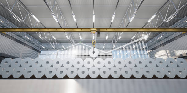 istock 3d rendering of rolled steel, overhead crane inside factory with increasing concept. 1482714250