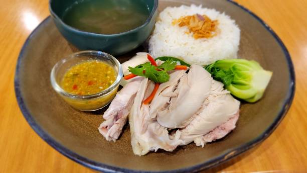 istock Chicken and rice with spicy sauce and hot soup 1482717384