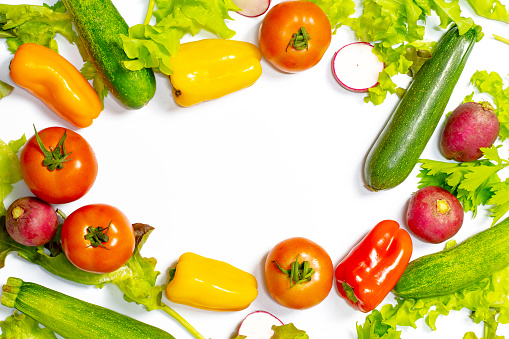 Flat lay composition with fresh ripe vegetables on white background