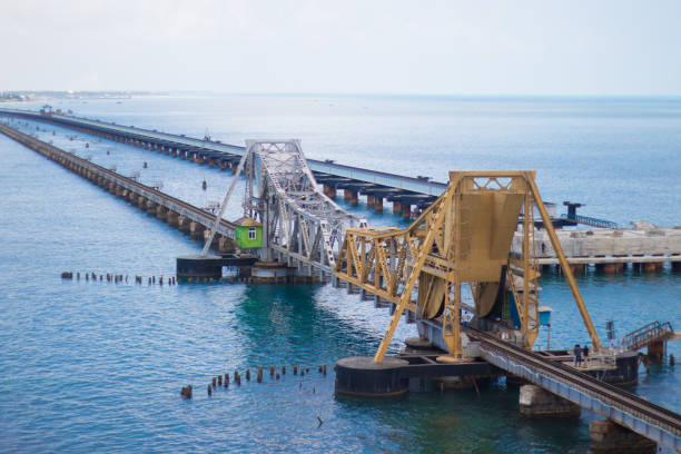 istock White and yellow railway bridge in sea 1482721056
