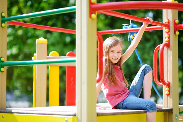 istock Cute little girl having fun on a playground 1482721850