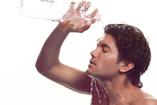 istock Athlete with water splash on his face 148272200