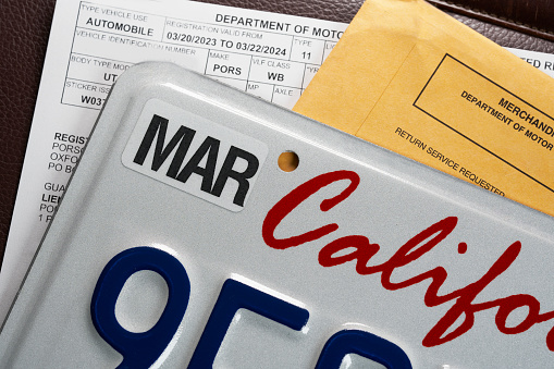 License plate registration for car with documents. DMV. USA