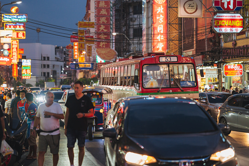 Bangkok, Thailand - december 10 2022:  busy street scene at Chinatown, pedestrians around China town Yaowarat Street in Bangkok Thailand