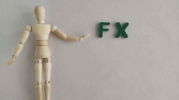 istock A photo material of a mannequin with a FX (Foreign Exchange) logo or emblem. 1482742736