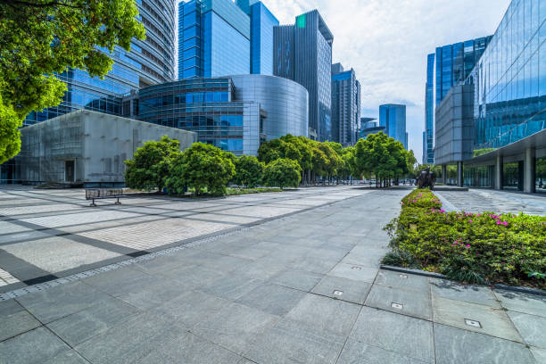 istock modern buildings and empty pavement in china 1482744971