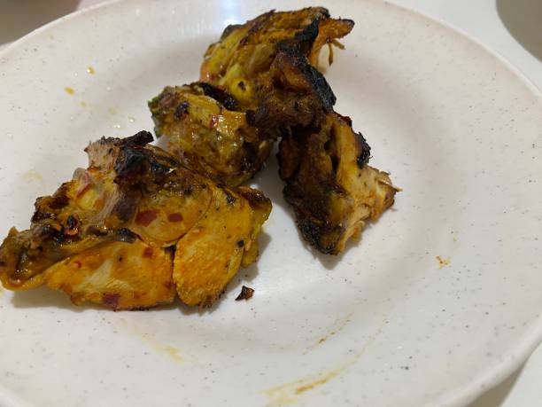 istock Baked chicken served with different sauces. 1482745434