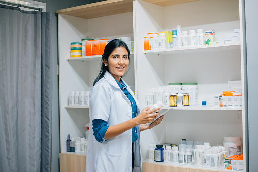Portrait of Asian Indian pharmacist.