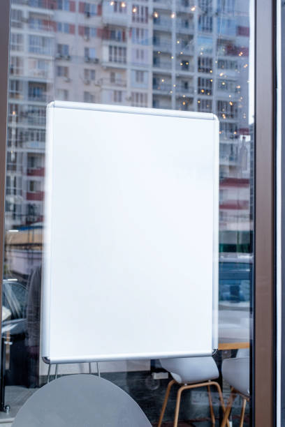 istock white rectangle logo on wall with windows ,exterior for mockup design 1482754442