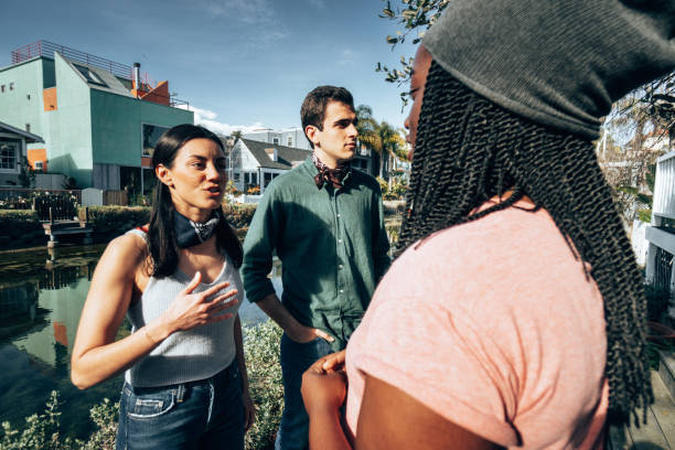 happiness multiracial friends talking outdoors in Venice