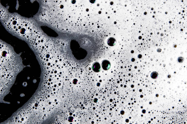 istock Abstract background white soapy foam texture. Shampoo foam with bubbles 1482758072