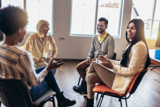 istock Support group patients on therapy session.Group therapy session, addiction treatment or team building. 1482759597